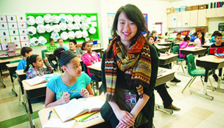 Student teacher in a classroom with students