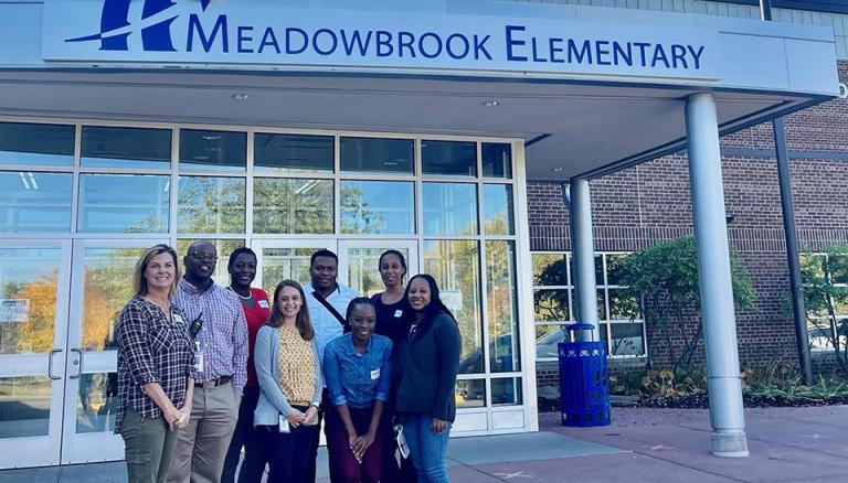 A group of teachers standing in front of Meadowbrook Elementary